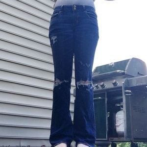 Low rise ripped flare jeans